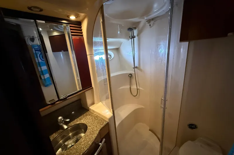  Yacht Photos Pics Luxurious bathroom in 2005 Sea Ray 500 Sedan Bridge yacht with shower and sink.