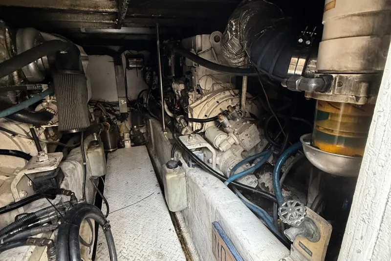  Yacht Photos Pics Engine room of a 2005 Sea Ray 500 Sedan Bridge yacht, showcasing mechanical components.