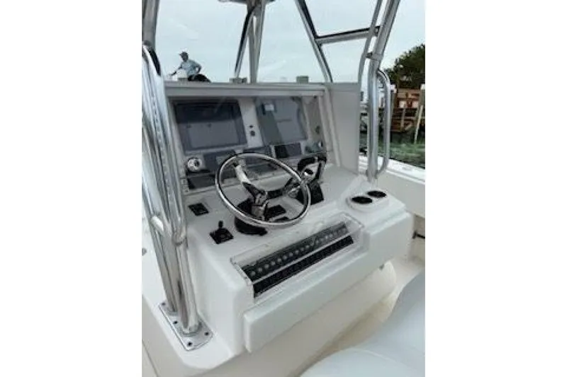 Sindylou Yacht Photos Pics Control console of a 2012 Invincible 36 Open Fisherman boat.