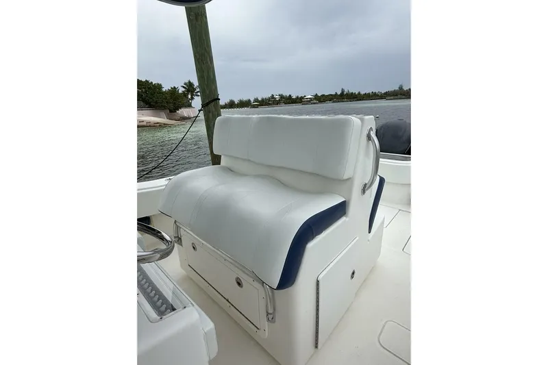 Sindylou Yacht Photos Pics 2012 Invincible 36 Open Fisherman boat seat with white and blue upholstery.