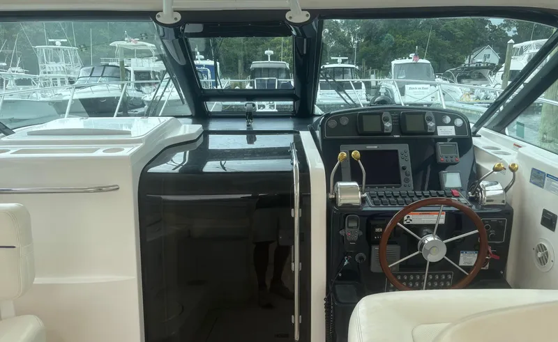  Yacht Photos Pics 2008 Tiara Yachts 3600 Open helm with modern navigation equipment and luxurious seating.