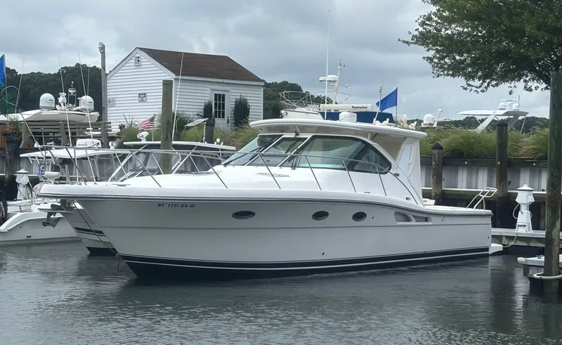  Yacht Photos Pics 2008 Tiara Yachts 3600 Open docked at a marina under cloudy skies.