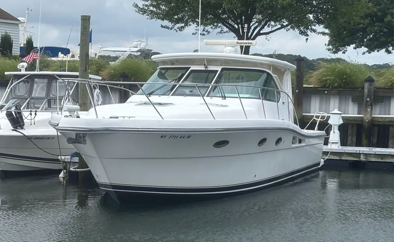  Yacht Photos Pics 2008 Tiara Yachts 3600 Open docked in a marina, surrounded by other boats.