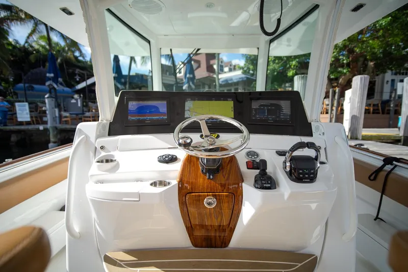 Sun Owl Yacht Photos Pics Helm of 2020 HCB 42 Lujo boat with modern navigation equipment and controls.