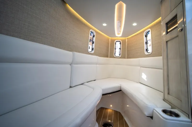 Sun Owl Yacht Photos Pics Interior of 2020 HCB 42 Lujo boat with white seating and modern lighting.