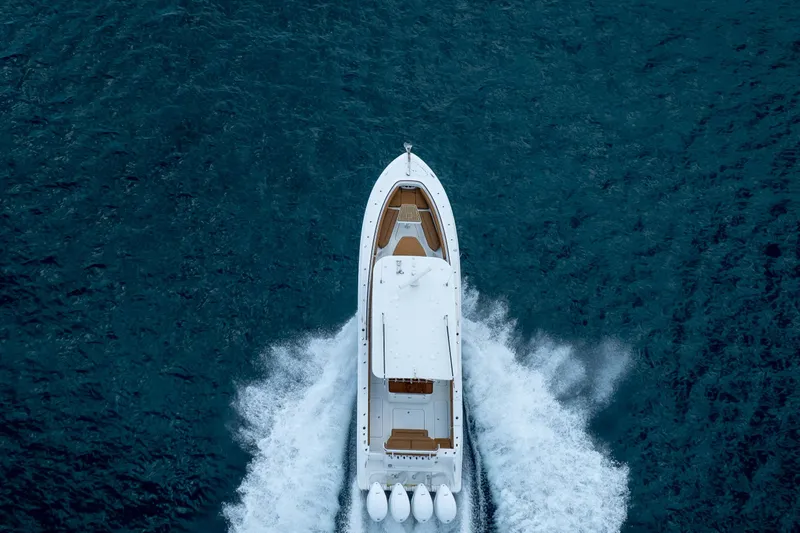 Sun Owl Yacht Photos Pics Aerial view of 2020 HCB 42 Lujo yacht cruising on open water.