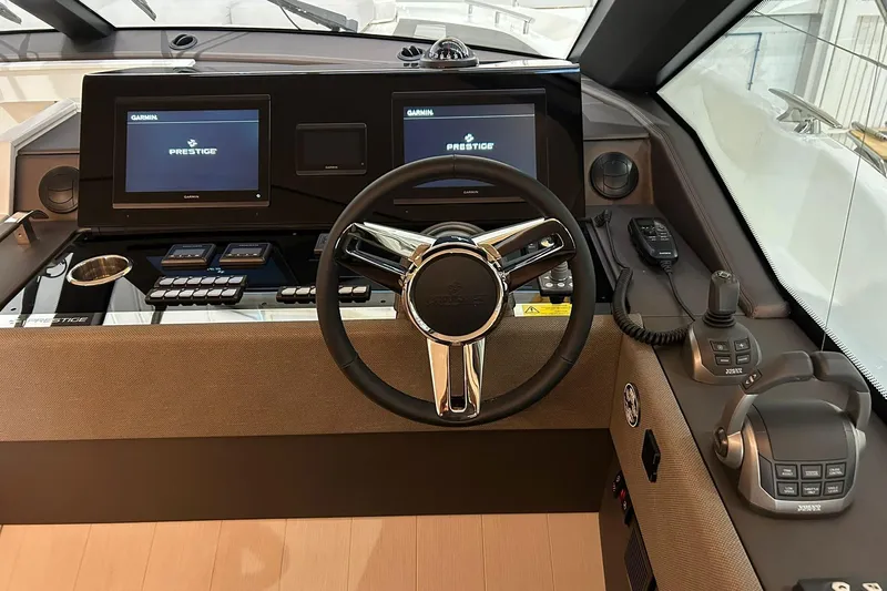  Yacht Photos Pics Steering console of 2026 Prestige F4.9 yacht with advanced navigation displays.