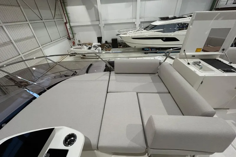  Yacht Photos Pics Luxurious 2026 Prestige F4.9 yacht interior with spacious seating and modern design.