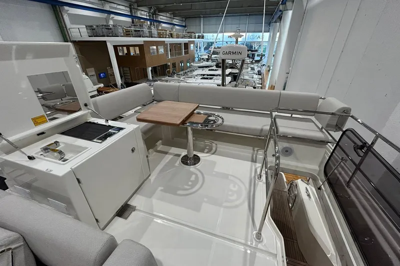  Yacht Photos Pics Prestige F4.9 yacht interior, 2026 model, featuring a sleek seating area and modern amenities.