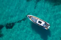 Aerial view of Nimbus T11 boat on clear turquoise water, 2022 model.