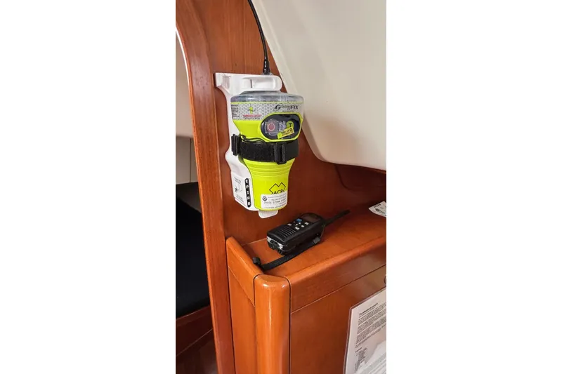 Tarahumara Yacht Photos Pics Emergency equipment on 2008 J Boats J/122, featuring EPIRB and handheld radio.