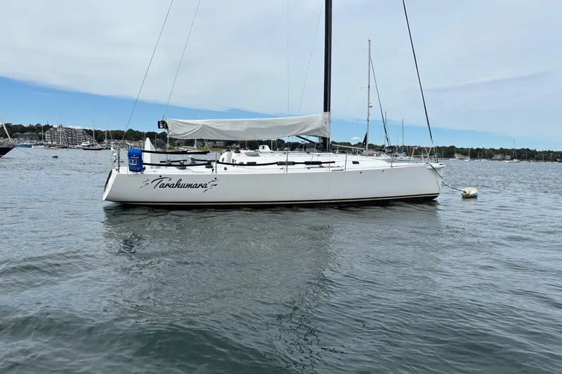 Tarahumara Yacht Photos Pics 2008 J Boats J/122 sailboat anchored in calm waters, side view.