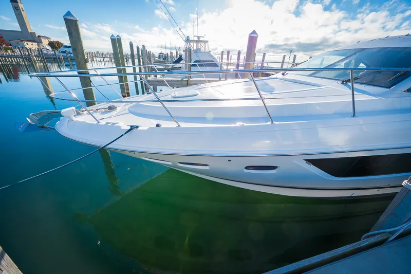 Trinity Yacht Photos Pics 2015 Sea Ray Sundancer 510 yacht docked at marina on a sunny day.