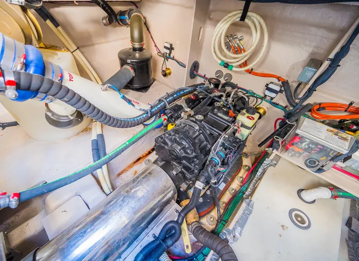 Trinity Yacht Photos Pics Engine compartment of a 2015 Sea Ray Sundancer 510 yacht with various mechanical components.