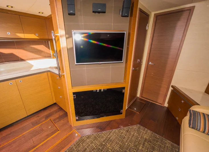 Trinity Yacht Photos Pics 2015 Sea Ray Sundancer 510 interior with TV, wooden cabinets, and modern design.
