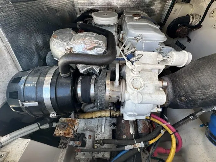 Lola Yacht Photos Pics Engine compartment of a 2005 Cabo 35 Flybridge boat.