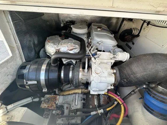 Lola Yacht Photos Pics Engine compartment of a 2005 Cabo 35 Flybridge boat.