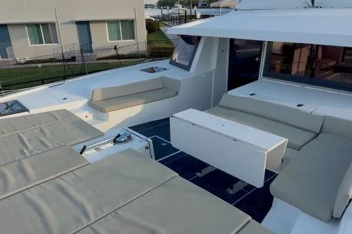 Joy Yacht Photos Pics 2021 Bali 5.4 yacht with spacious outdoor seating and modern design.