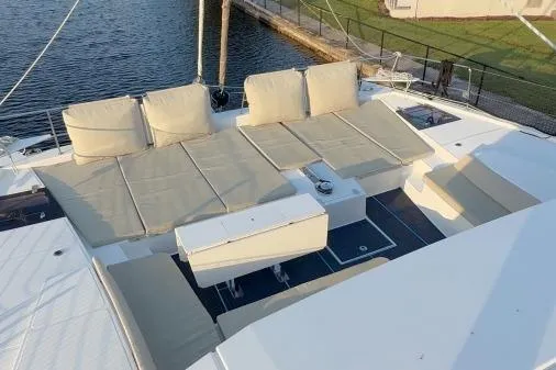 Joy Yacht Photos Pics Luxurious 2021 Bali 5.4 yacht with spacious sunbathing area and comfortable seating.
