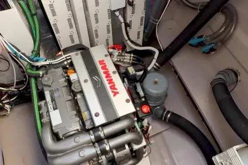 Joy Yacht Photos Pics Engine compartment of a 2021 Bali 5.4 yacht featuring a Yanmar engine.