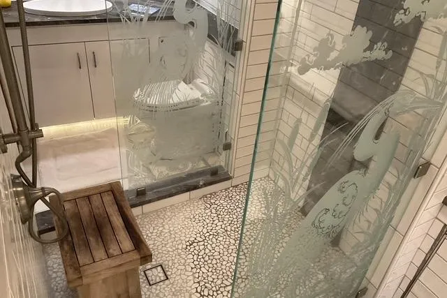 Moor River Yacht Photos Pics Luxurious bathroom on 1997 Hatteras 70 Sport Deck Motor Yacht with elegant glass shower.