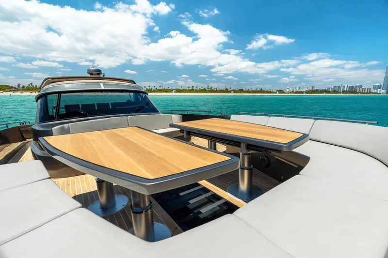 Yours Yacht Photos Pics Luxurious 2016 CNM Continental Tender yacht with elegant outdoor seating and ocean view.