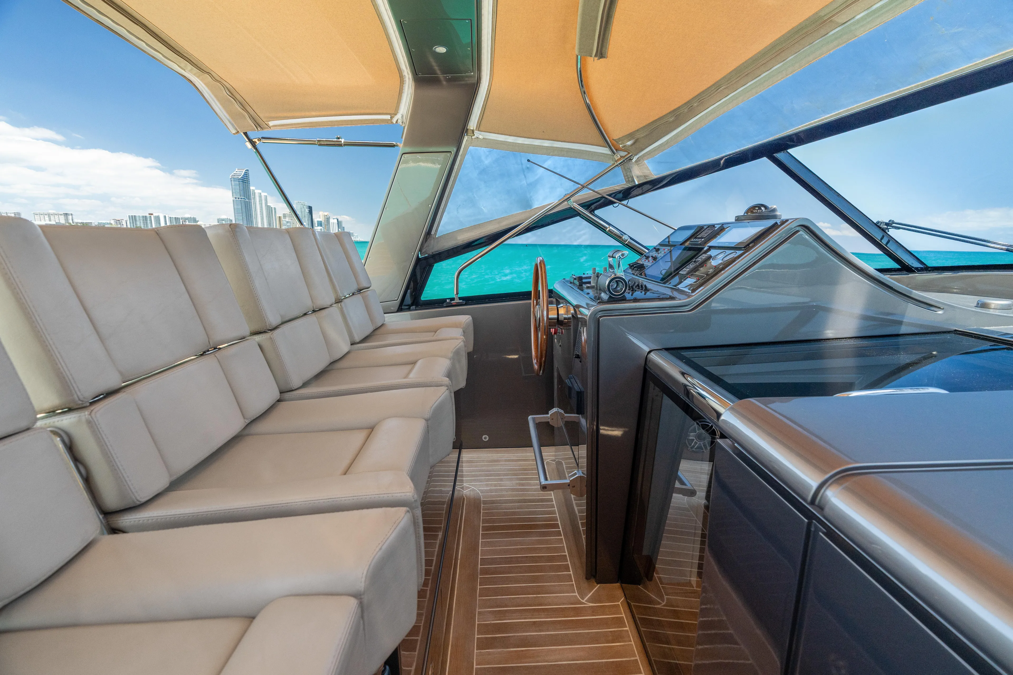 Yours Yacht Photos Pics Luxurious interior of 2016 CNM Continental Tender yacht with leather seating and modern dashboard.