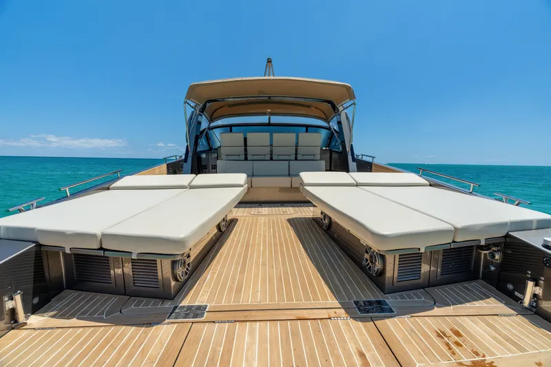 Yours Yacht Photos Pics Luxurious 2016 CNM Continental Tender yacht with sunbeds on a sunny day at sea.