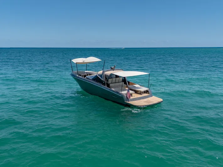 Yours Yacht Photos Pics 2016 CNM Continental Tender boat on clear blue ocean water.