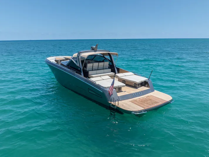 Yours Yacht Photos Pics Luxurious 2016 CNM Continental Tender yacht on clear blue ocean waters.