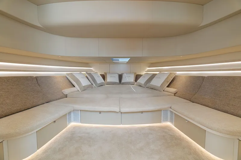 Yours Yacht Photos Pics Luxurious interior of 2016 CNM Continental Tender yacht with plush seating and ambient lighting.
