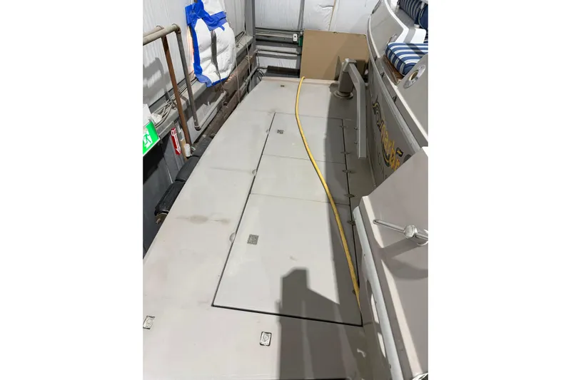  Yacht Photos Pics 1994 Ferretti Yachts 185 Fly deck with storage compartments and seating.