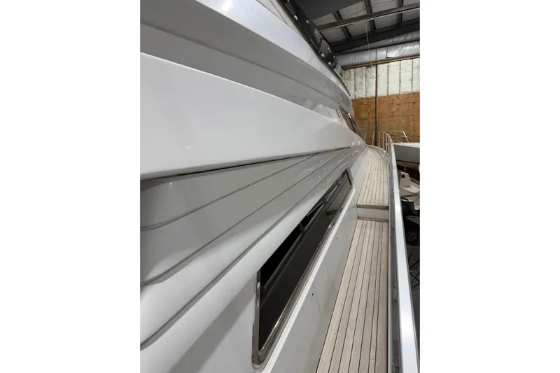  Yacht Photos Pics Side view of 1994 Ferretti Yachts 185 Fly in a storage facility.