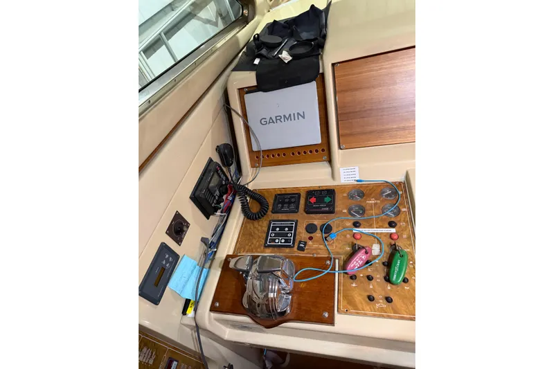  Yacht Photos Pics Control panel of a 1994 Ferretti Yachts 185 Fly with Garmin navigation system.