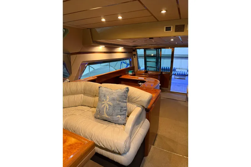  Yacht Photos Pics Luxurious interior of 1994 Ferretti Yachts 185 Fly with plush seating and elegant decor.