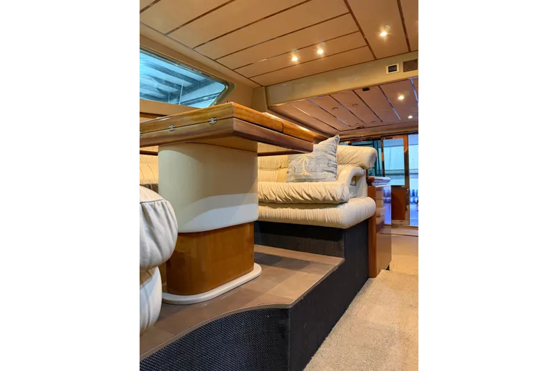  Yacht Photos Pics Luxurious interior of 1994 Ferretti Yachts 185 Fly with plush seating and elegant design.