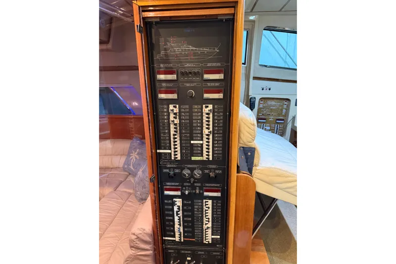  Yacht Photos Pics Control panel inside 1994 Ferretti Yachts 185 Fly, featuring switches and circuit breakers.