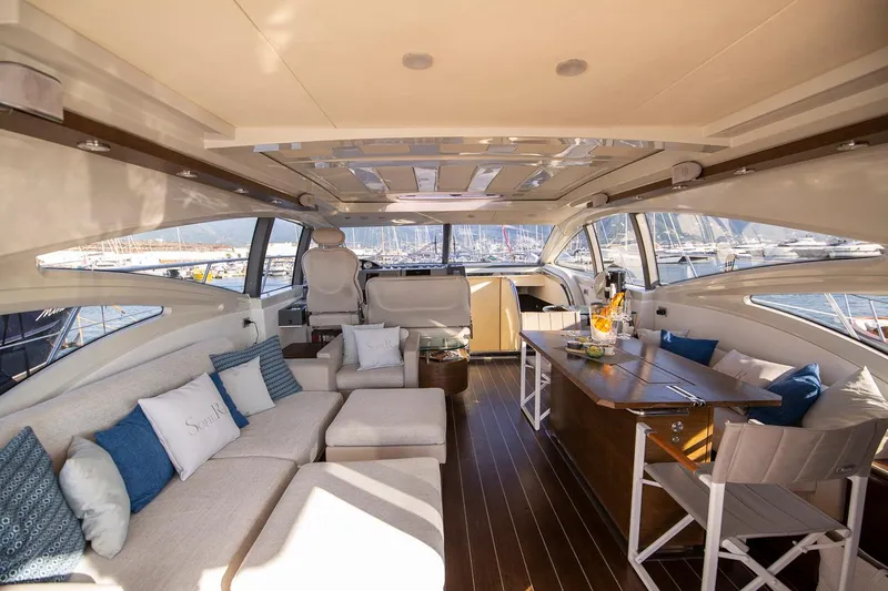 Sofierì Yacht Photos Pics Luxurious interior of a 2005 Azimut 68S yacht with elegant seating and dining area.
