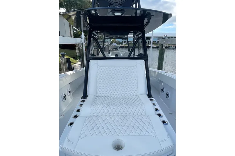  Yacht Photos Pics 2023 Conch 41 Center Console boat with luxurious white seating and sleek design.