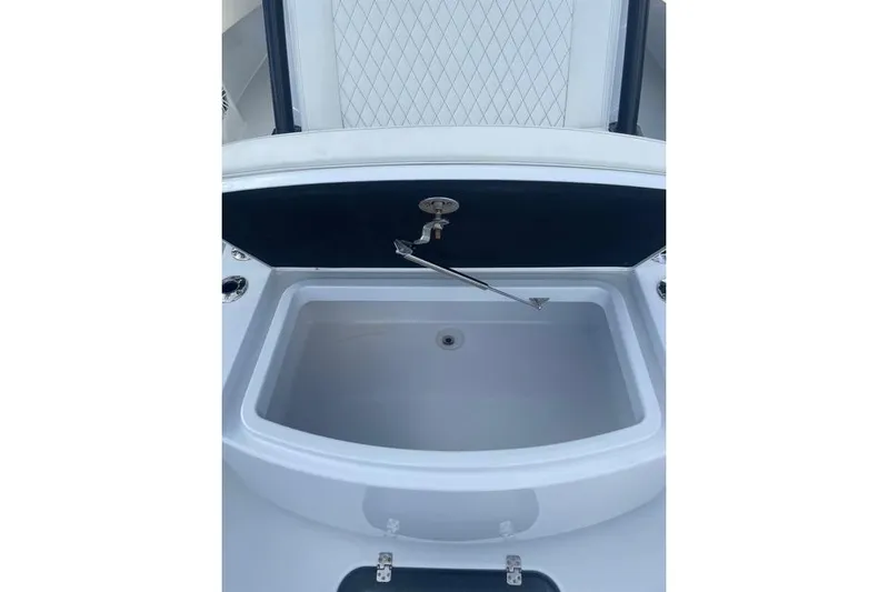  Yacht Photos Pics 2023 Conch 41 Center Console boat sink with faucet and storage compartment.
