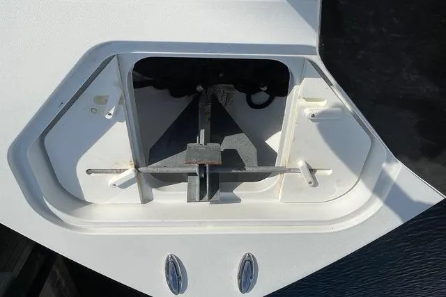  Yacht Photos Pics Anchor compartment of 2023 Conch 41 Center Console boat, featuring a neatly stored anchor.