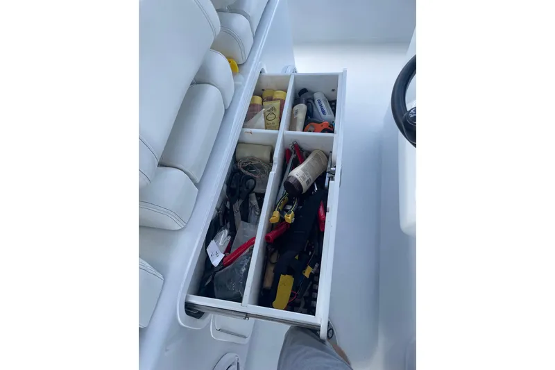  Yacht Photos Pics Storage drawer with tools and supplies on 2023 Conch 41 Center Console boat.