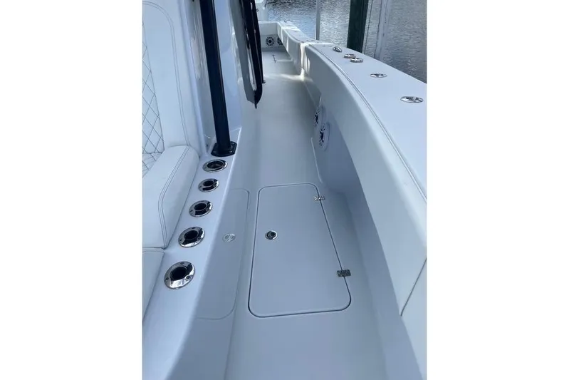  Yacht Photos Pics 2023 Conch 41 Center Console boat interior with rod holders and sleek design.