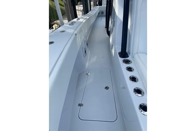  Yacht Photos Pics 2023 Conch 41 Center Console boat interior with rod holders and storage compartments.