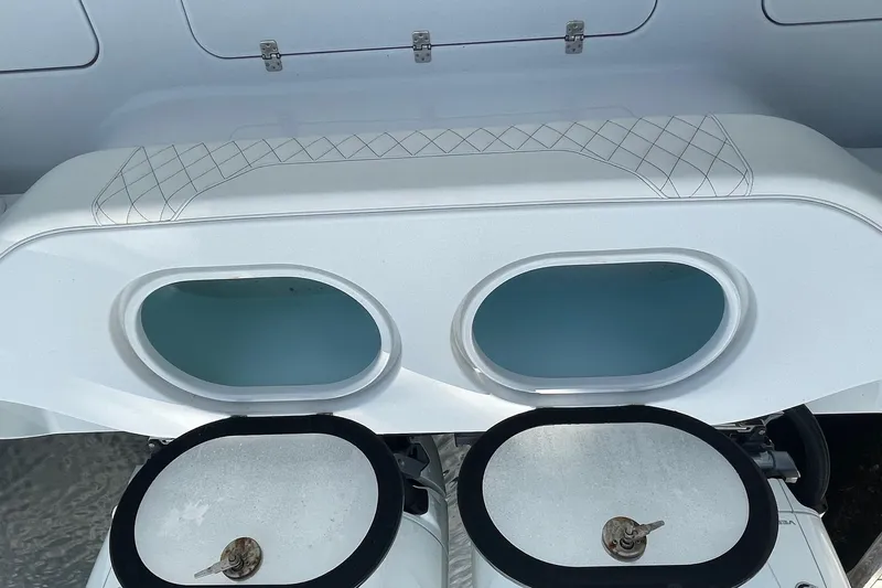  Yacht Photos Pics 2023 Conch 41 Center Console boat with dual live wells and sleek design.