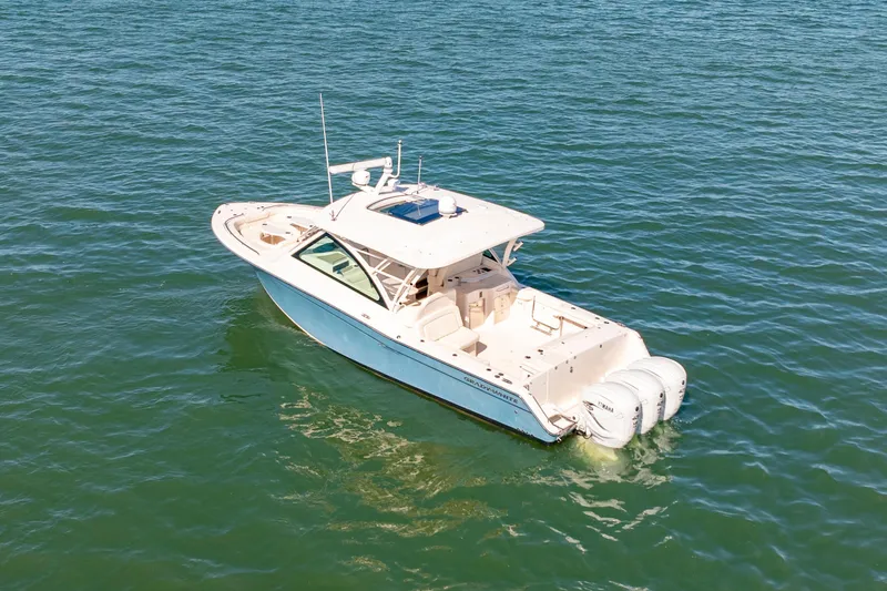  Yacht Photos Pics 2019 Grady-White Freedom 375 boat on open water, aerial view.