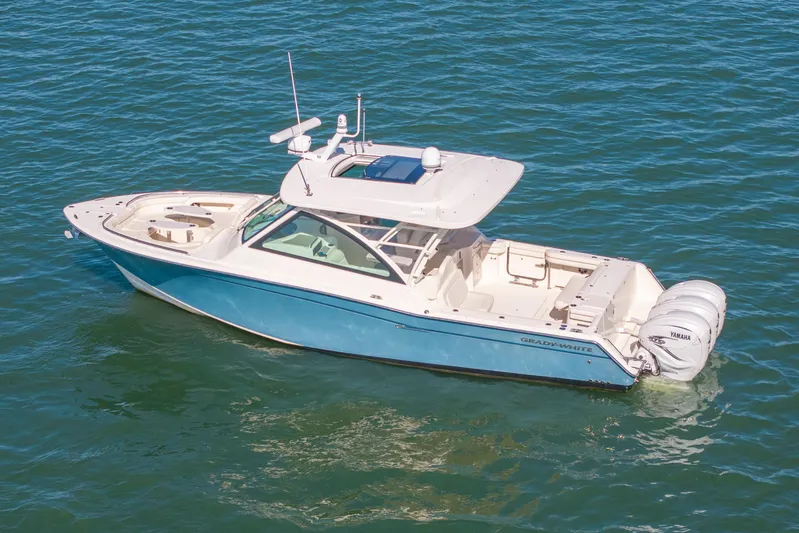  Yacht Photos Pics 2019 Grady-White Freedom 375 boat on open water, featuring dual Yamaha engines.