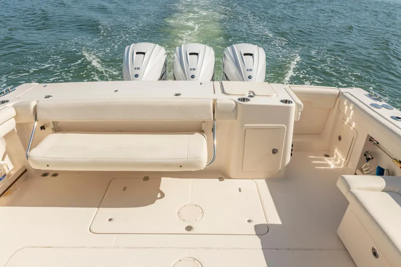  Yacht Photos Pics 2019 Grady-White Freedom 375 boat with triple V8 engines on open water.
