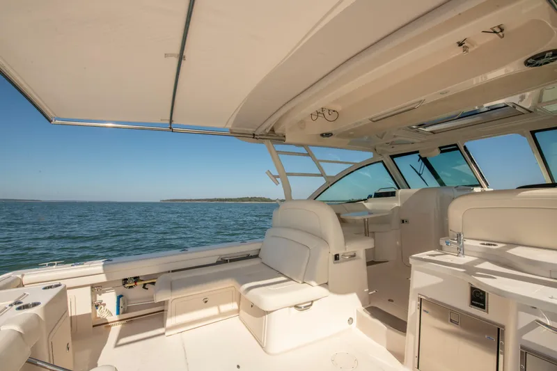  Yacht Photos Pics 2019 Grady-White Freedom 375 boat interior with luxurious seating and ocean view.