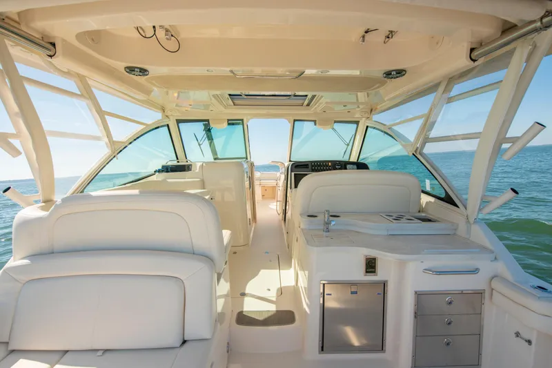  Yacht Photos Pics 2019 Grady-White Freedom 375 boat interior with luxurious seating and ocean view.